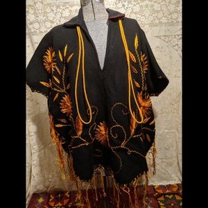 Vintage embroidered poncho with fringe